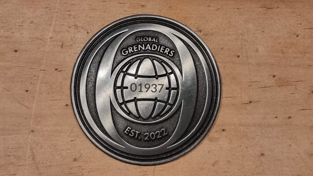 Global Grenadiers Plakette mit Mitgliedsnummer.